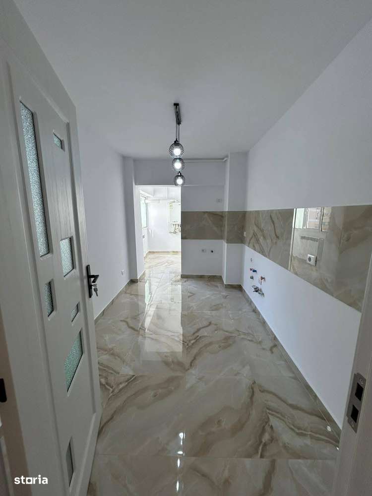 De vanzare 4 camere,2 bai,2 balcoane situat in zona Primariei-9