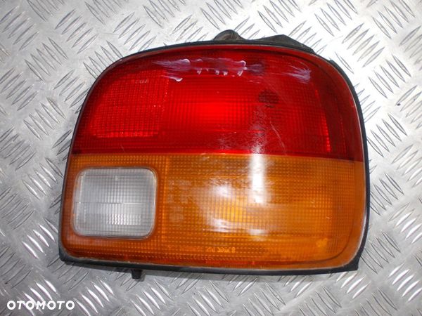 Daihatsu Cuore IV - lampa tylna prawa - 1