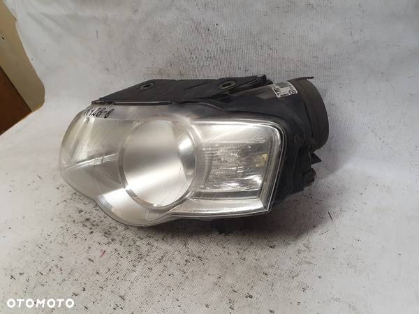 .  PRZOD PRZEDNIA LAMPA LEWA VOLKSWAGEN PASSAT B6 - 2