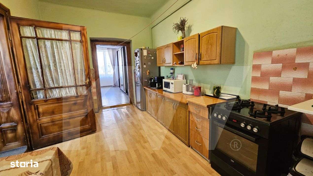 Casa individuala compusa din doua apartamente, cu teren liber de 540 m - Imagine principală: 3/19