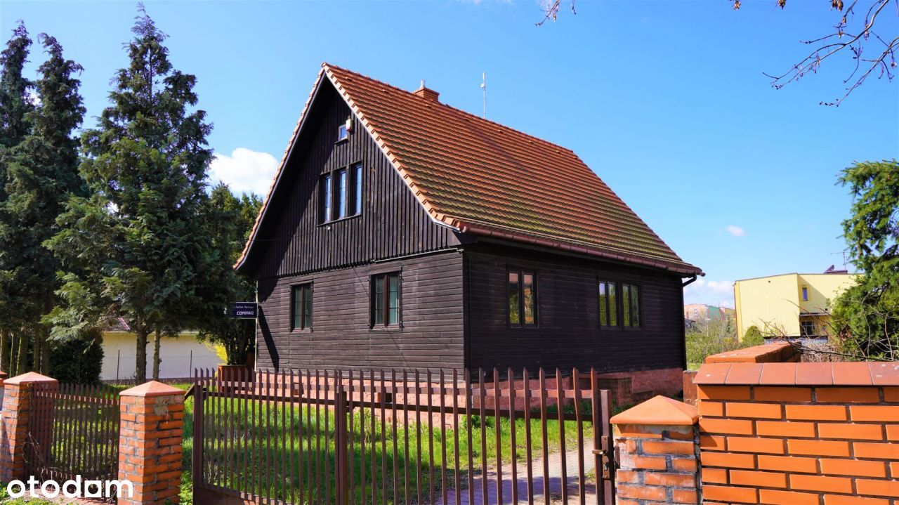 dom z drewna w centrum miasta Turek na sprzedaż
