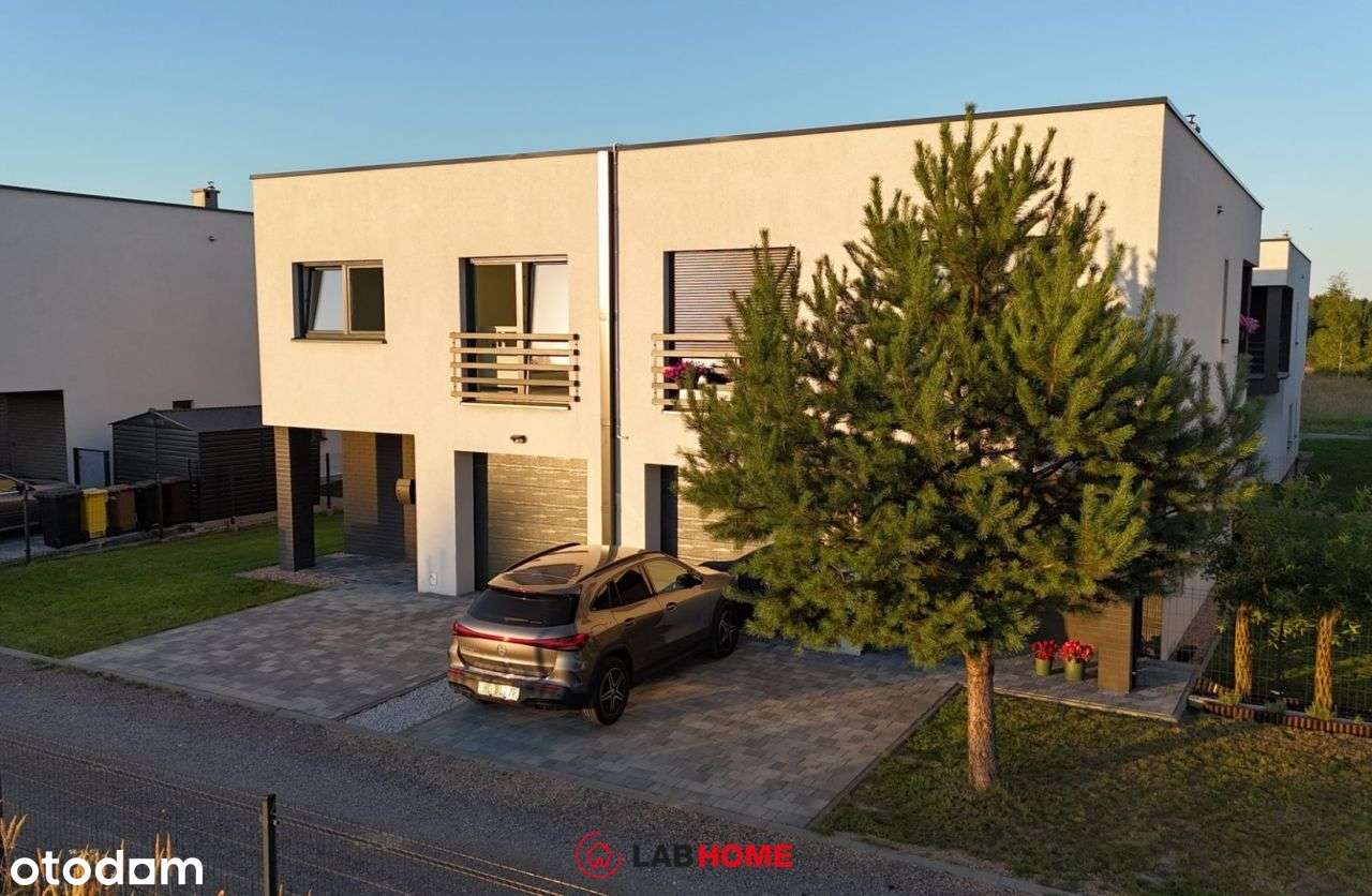 Komfortowy bliźniak na zielonym uboczu aglomeracji