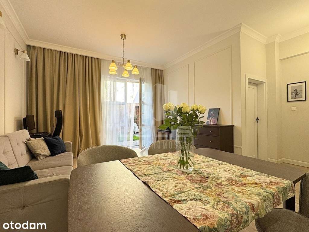 Okazałe mieszkanie w centrum z prywatnym ogrodem-1