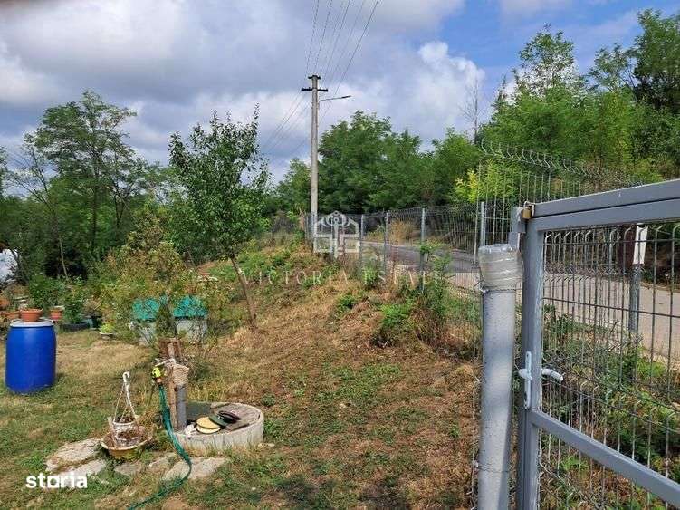Casa si teren 2000 mp-5