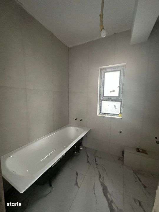 Vanzare Apartament 2 camere+curte 60mp si 2 locuri de parcare-12