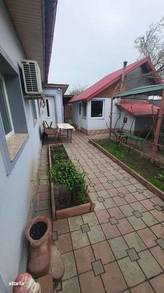 Casa si teren + Spatiu Comercial Rosiorii de Vede pozitie foarte buna - Imagine principală: 4/8