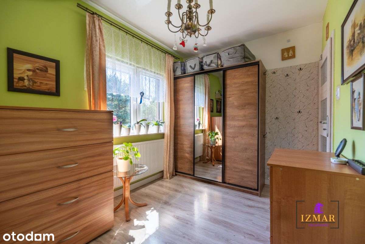 Funkcjonalny dom z 2 garażami i ogrodem-5