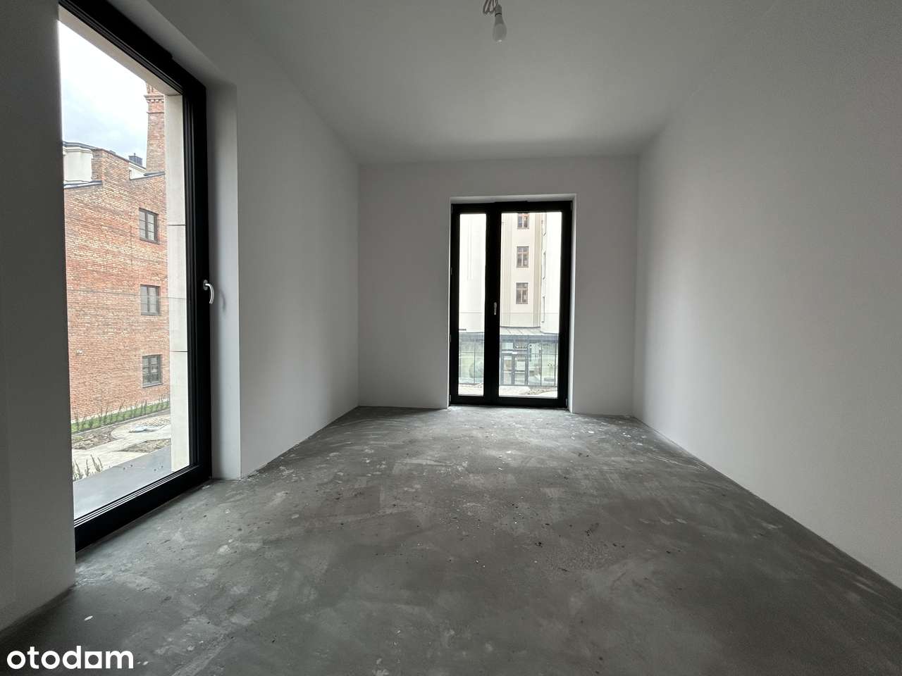 Przestronny apartament  w Centrum w stanie deweloperskim z garażem - Pełny obrazek: 2/13