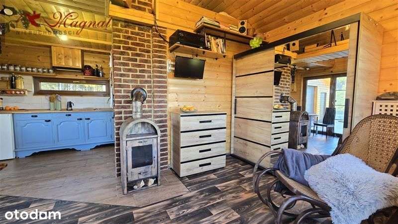 Atrakcyjny dom drewniany całoroczny na dużej dział-9