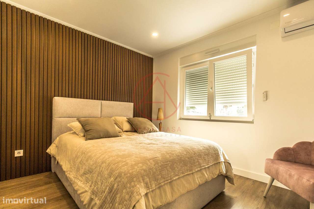 R/C de Moradia bi-familiar com quintal e garagem individual-17