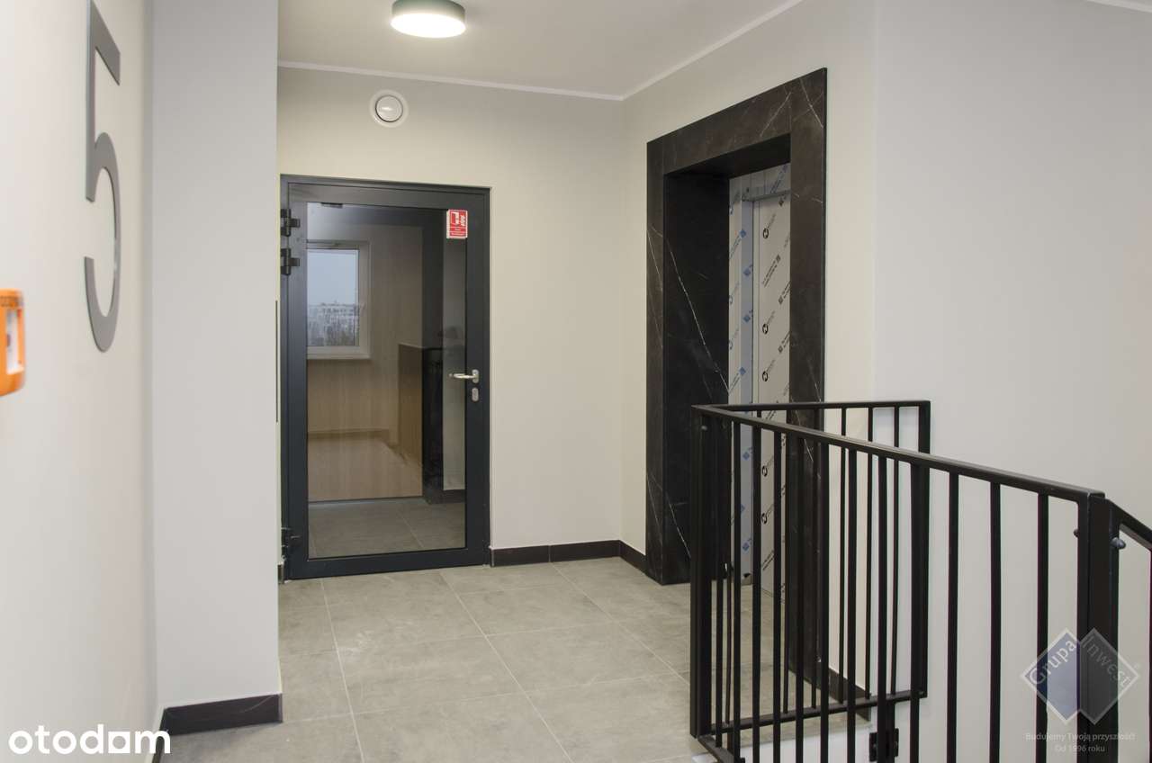 Z widokiem na zadrzewienie! Dwupoziomowe mieszkanie Jasielska Poznań-13