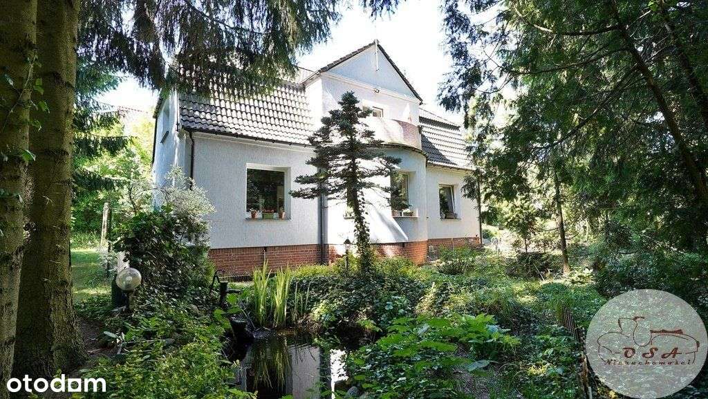 Dom z duszą na leśnej skarpie Puszczykowo Górne
