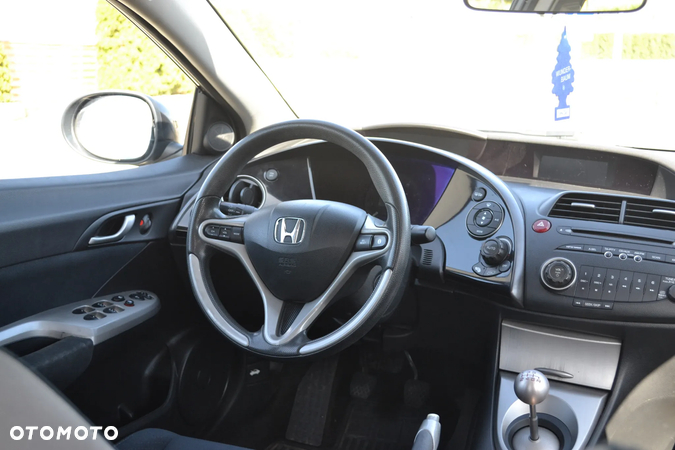 Honda Civic 1.8 Comfort - 14