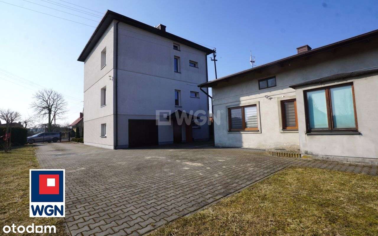 Praktyczny dom z dużym terenem..-1