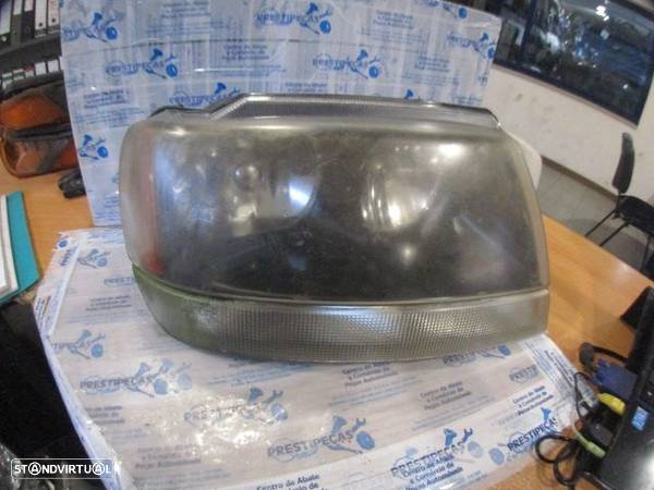 Farol 61B50050092 JEEP GRAND CHEROKEE 1 FASE 2 2005 3.1CRD 4X4 140CV 5P VERDE DRT HB3A + HB4A SYLVANIA - 1