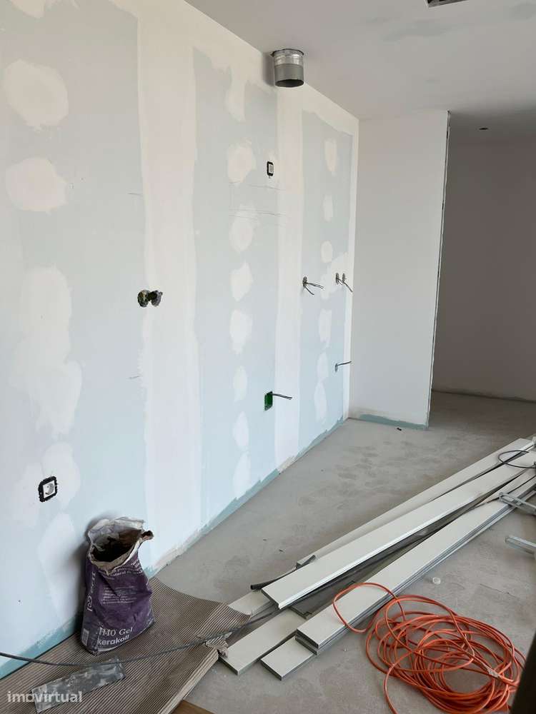 T2 novo com garagem, varanda e ar condicionado-4