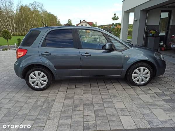 Suzuki SX4 1.6 GLX / Comfort - 9