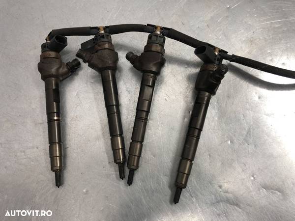 Injector VW Passat B7 Variant 2.0 BlueTDI Manual 140cp - 1