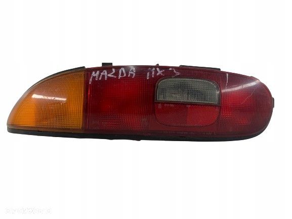 MAZDA MX3 LAMPA LEWA TYŁ - 1