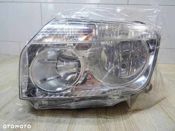 DACIA DUSTER I LAMPA PRAWA 260601153R - 1