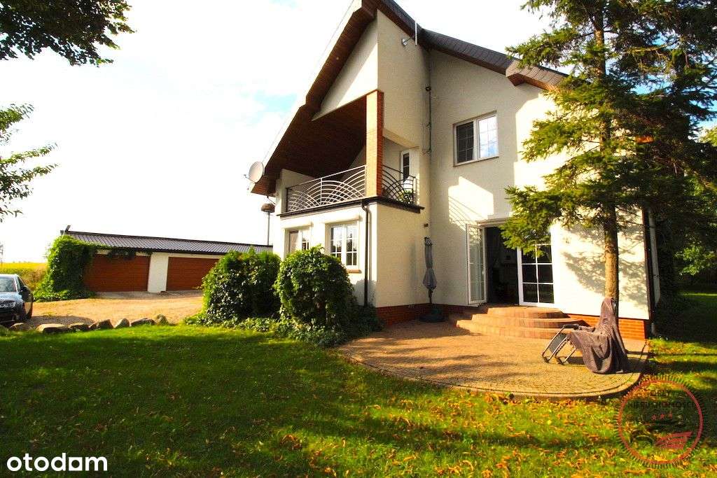 Dom z Ogrodem nad Jeziorem – Komfort i Spokój w Dź-12