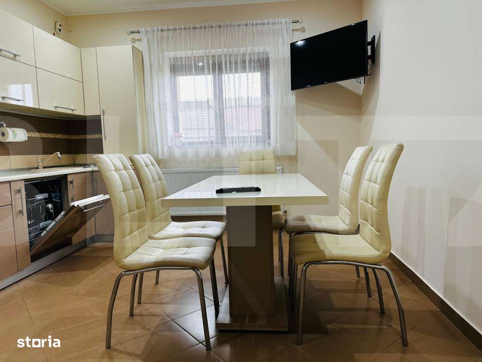 Casa spatioasa cu 5 dormitoare, doua bucatarii si teren de 1100 mp - Imagine principală: 2/17