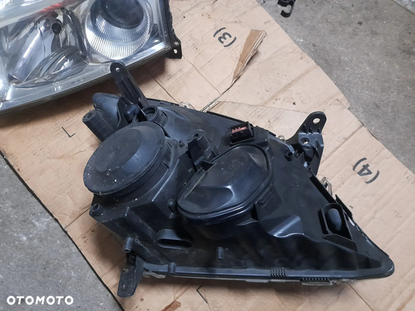 Opel lampa przednia lewa 155887-00 - 4