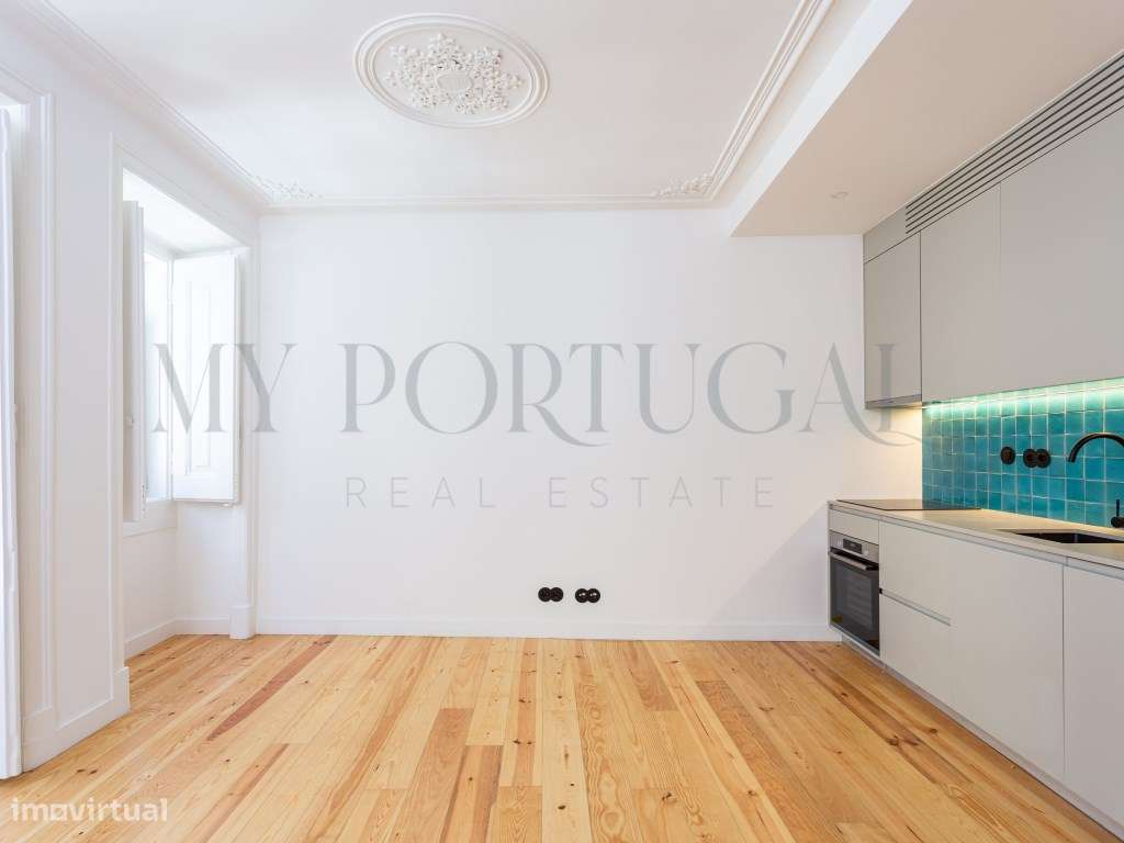 Conforto Urbano num T1 totalmente remodelado com varanda no coração...-7