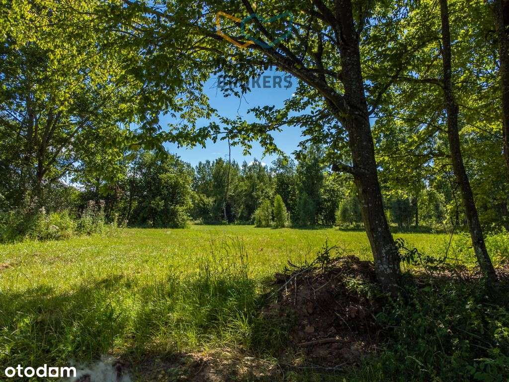 Działka budowlana nad jeziorem z dostępem do plaży-12
