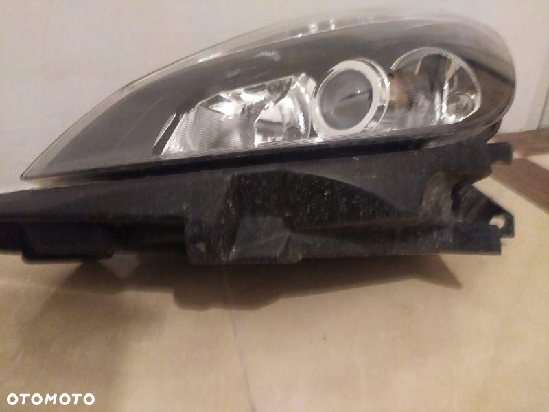 REFLEKTOR LEWY LAMPA DOŚWIETLANIE RENAULT CLIO III - 3