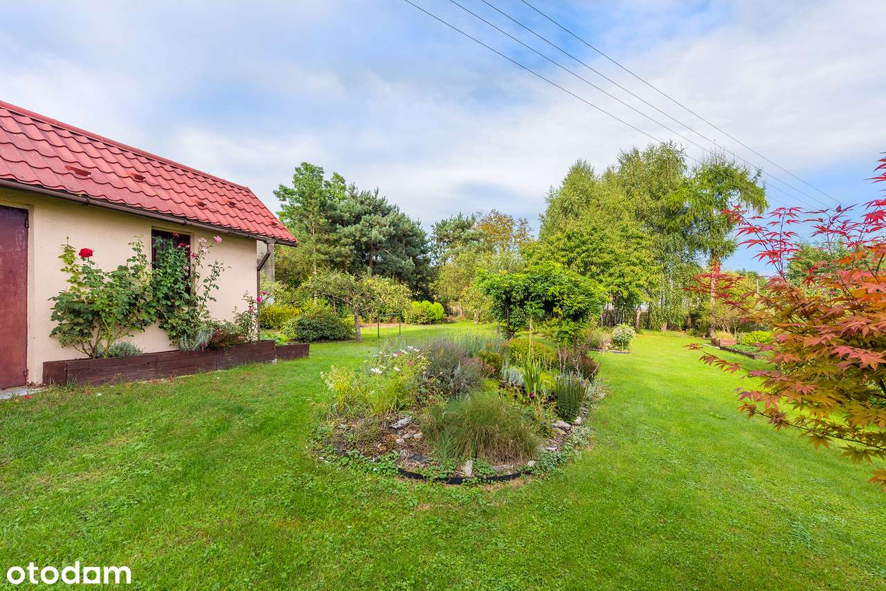 Wyjątkowa nieruchomość z pięknym ogrodem-11