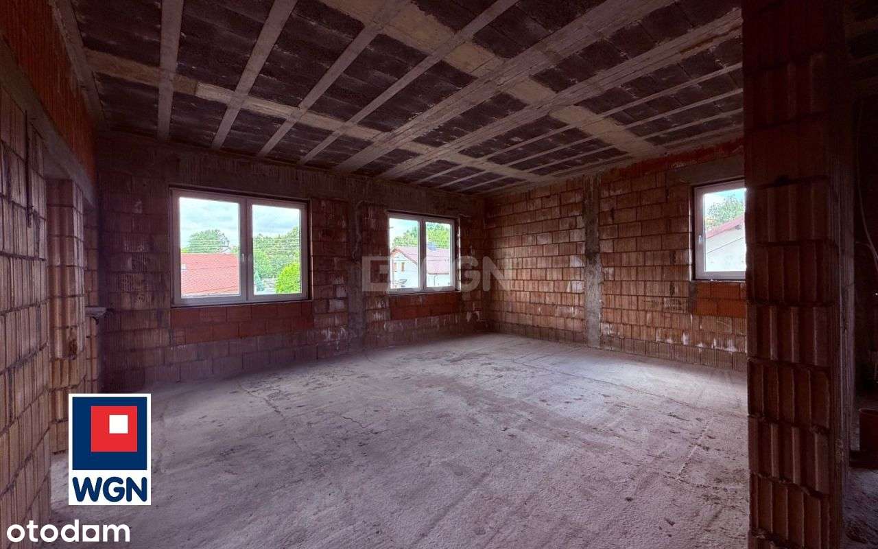 Budynek handlowo-usługowy z częścią mieszkalną sta-14