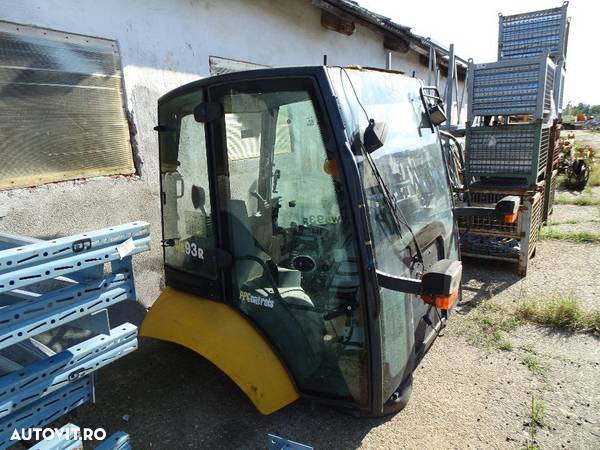 Piese Cabina buldoexcavator Komatsu WB 93 R5  din 2008 - 1