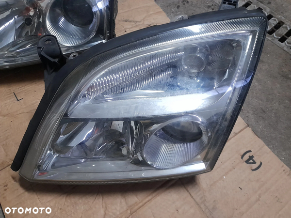 Opel lampa przednia lewa 155887-00 - 2