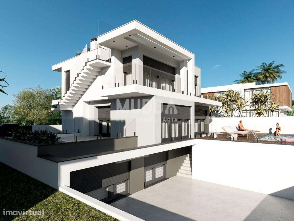 Moradia isolada de design contemporâneo nos Casais Mestre Mendo-7