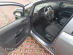 Opel Corsa 1.2 16V Cosmo - 23