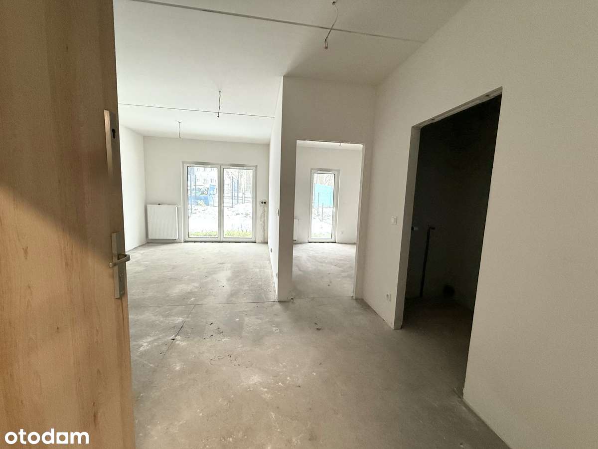 Parterowe mieszkanie 2pokojowe z ogródkiem i miejscem w hali garażowej-9