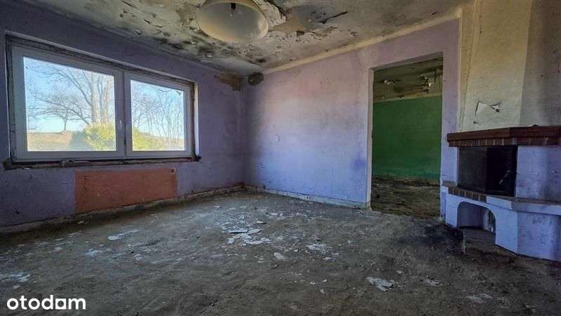 Połowa domu do remontu, duży potencjał.-14