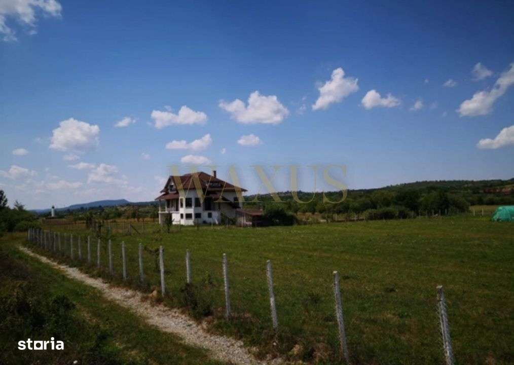 Casa cu 2 nivele,6 camere,70 arii de teren - Imagine principală: 3/8