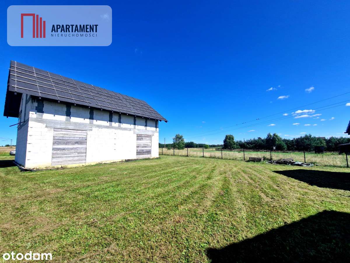 Budynek mieszkalny z domkami rekreacyjnymi.-4