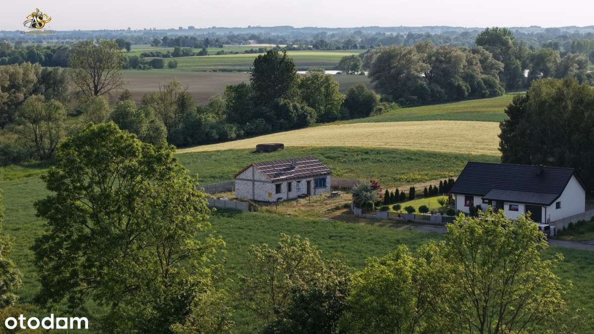 Działka z rozpoczęta budową domu