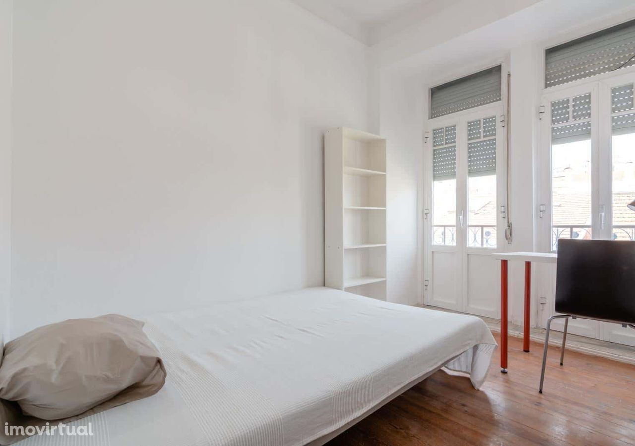 Quarto com cama de casal em apartamento com 9 quartos - FLAT N - N2