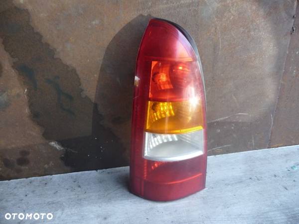 OPEL ASTRA G 2 II KOMBI LAMPA LEWY TYŁ TYLNA LEWA - 1