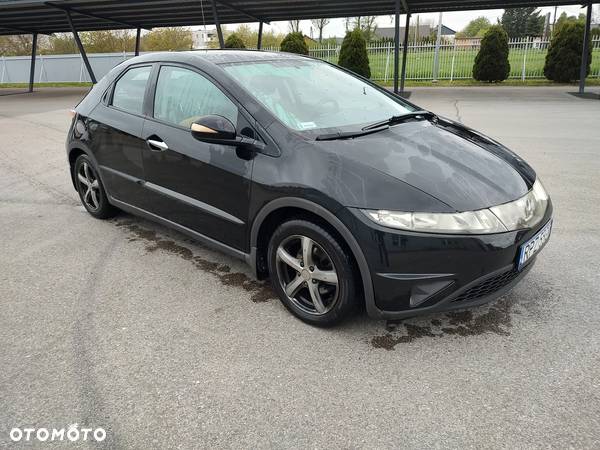 Honda Civic 1.4 Comfort - 1