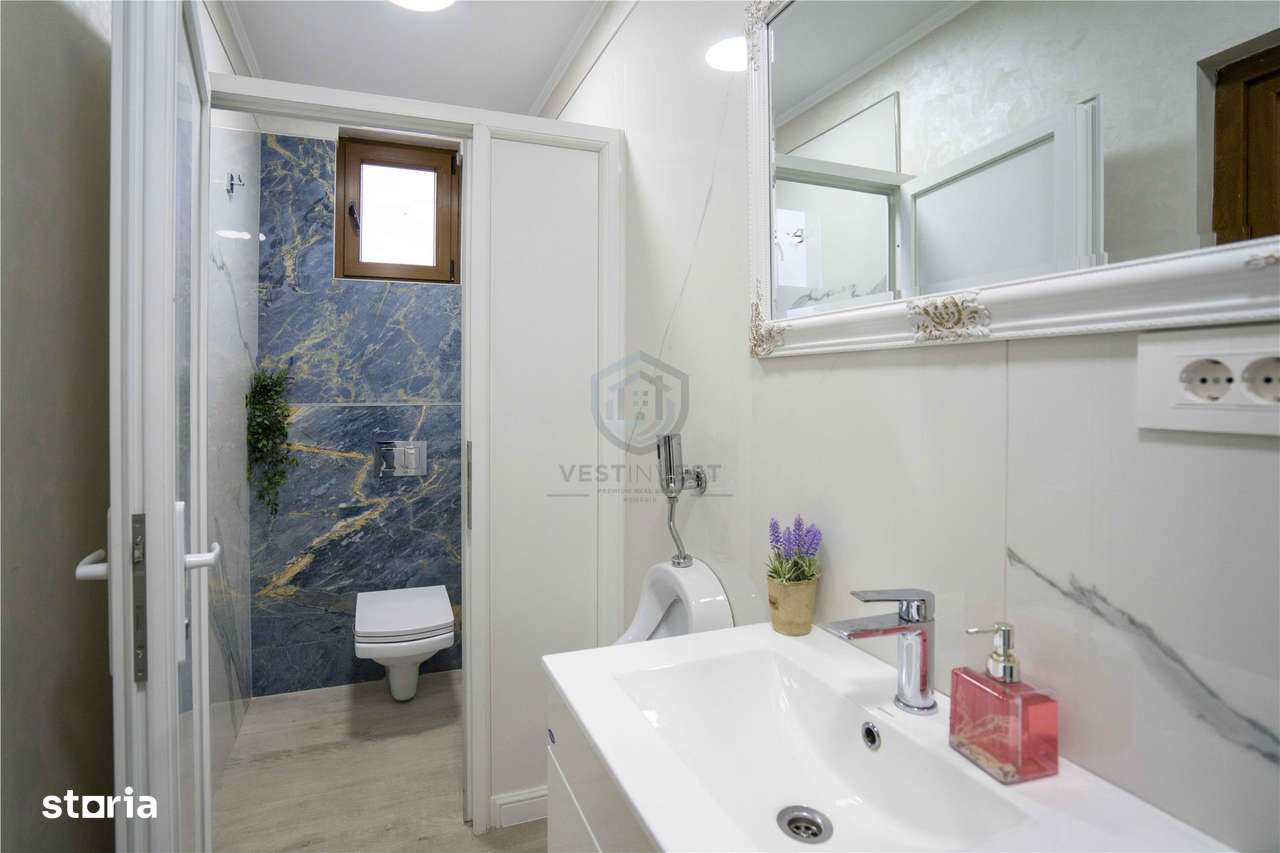 Baza de tenis si constructie moderna - Imagine principală: 4/20