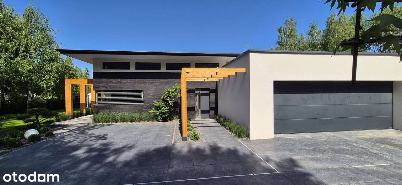 Nowoczesny dom 4 pok. z garażem w spokojnej okolicy-0