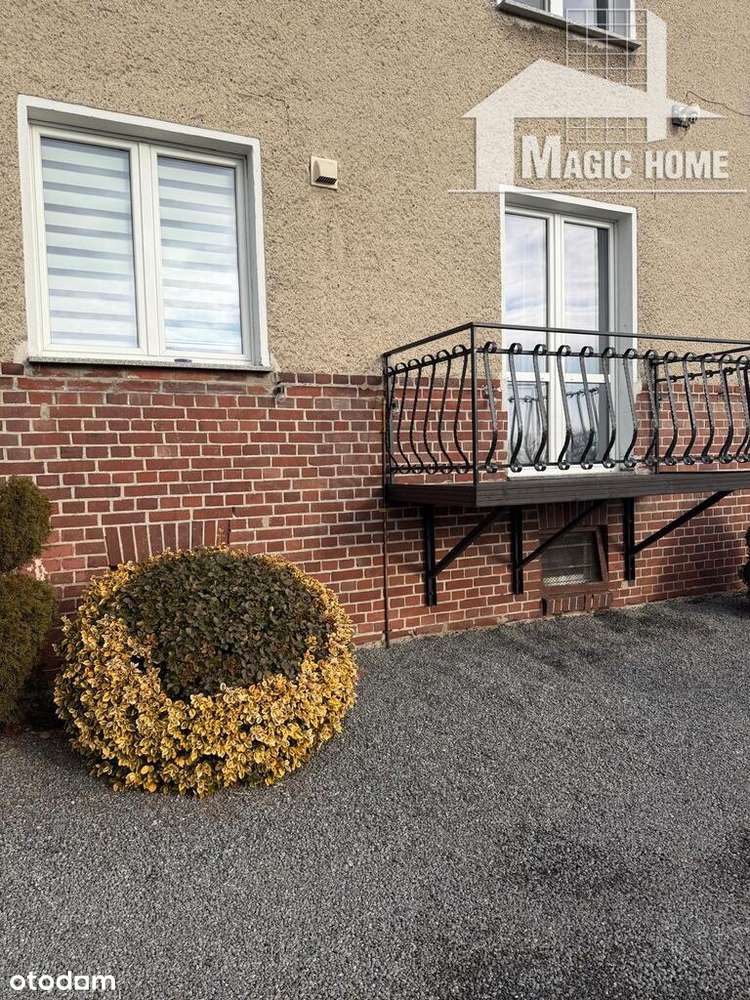 Mieszkanie z ogródkiem i garażem-0