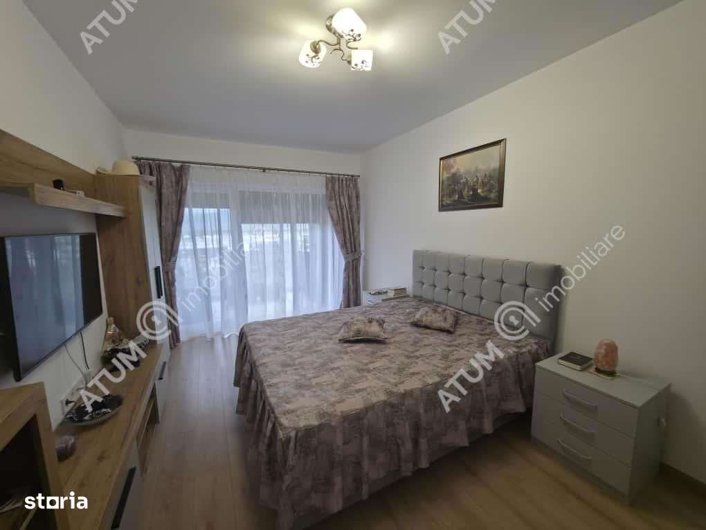 Garsoniera decomandata cu balcon si parcare in zona DaVinci din Sibiu-1