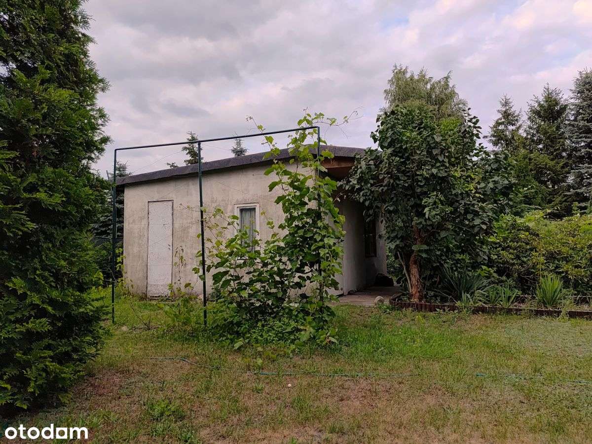 Działka z murowanym domkiem.-4