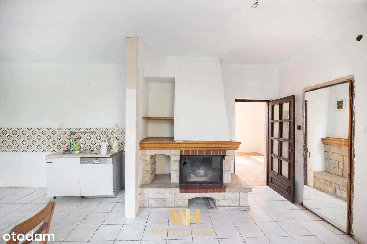 Dom wolnostojący w otoczeniu drzew. Zakroczym.-9